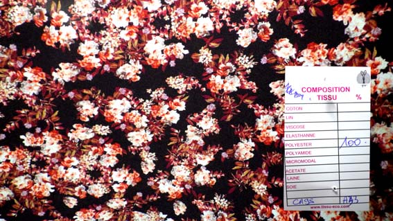 100%polyester fleuri/rouge/noir vendu au m(CA95)